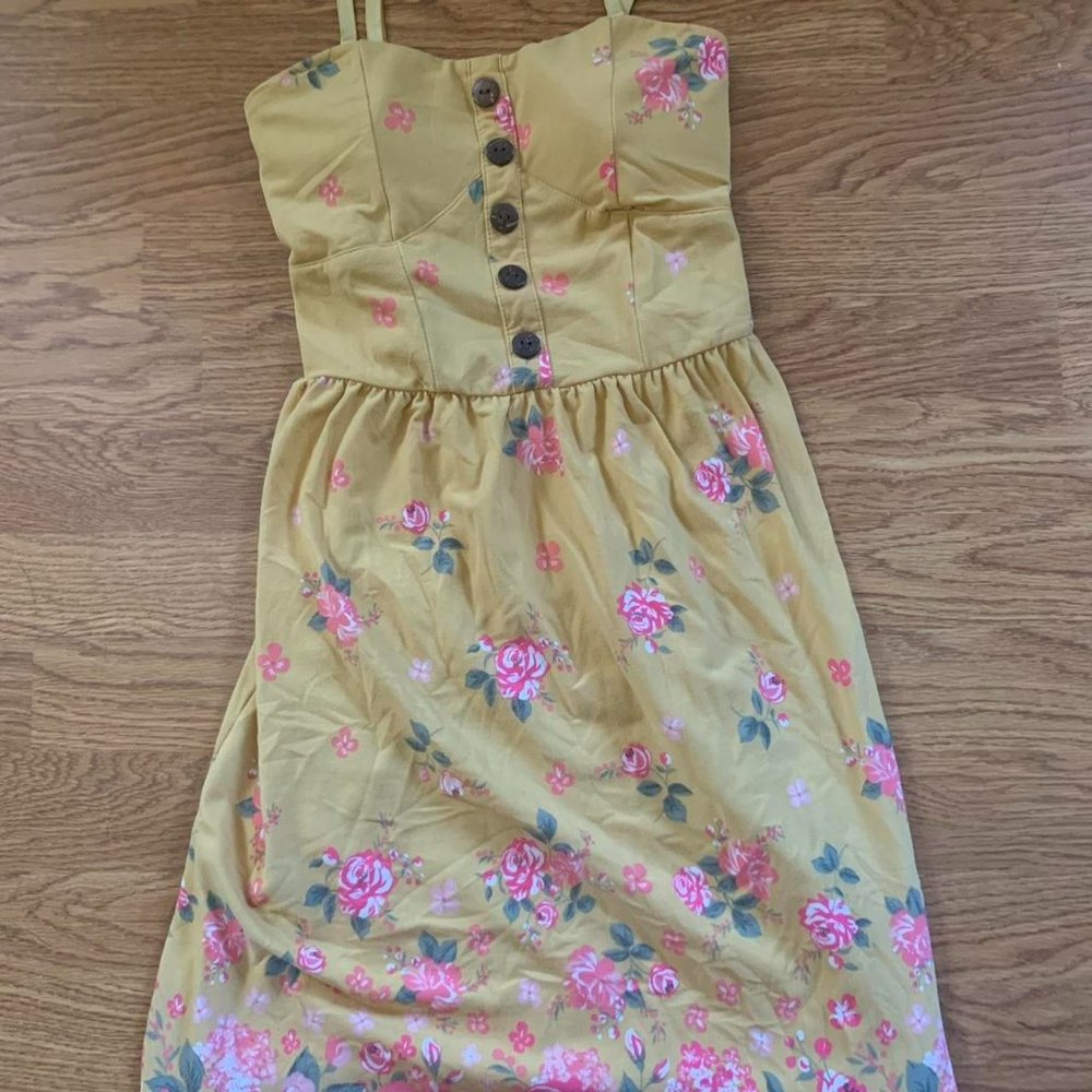 Yellow sundress with pink flowers